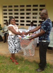 Presenting samples of the books to the Assembly man